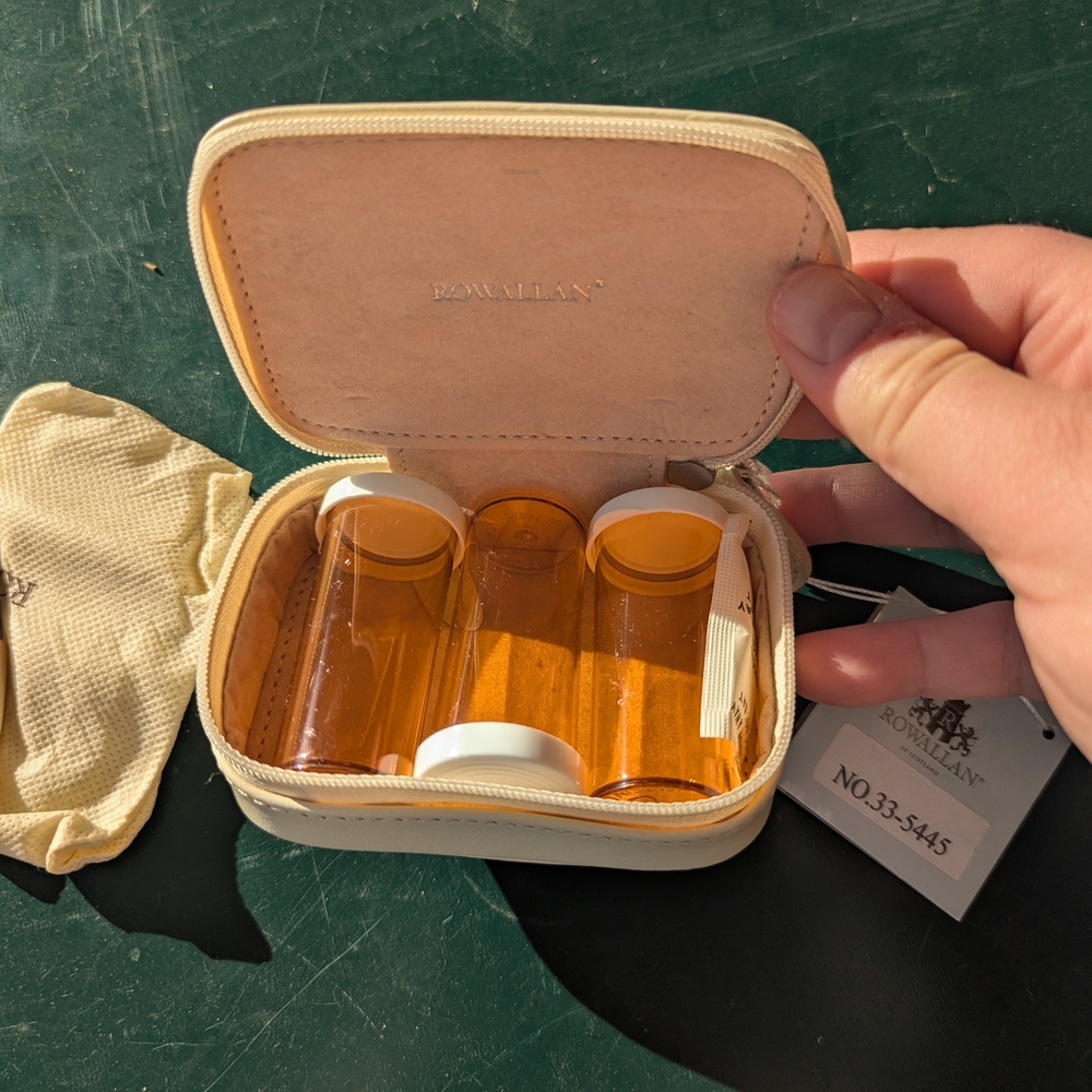Rowallan Cream Cosmetic Bag with Amber Bottles